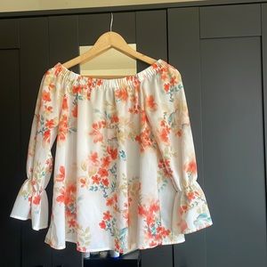 small off the shoulder floral shirt, slightly see through.